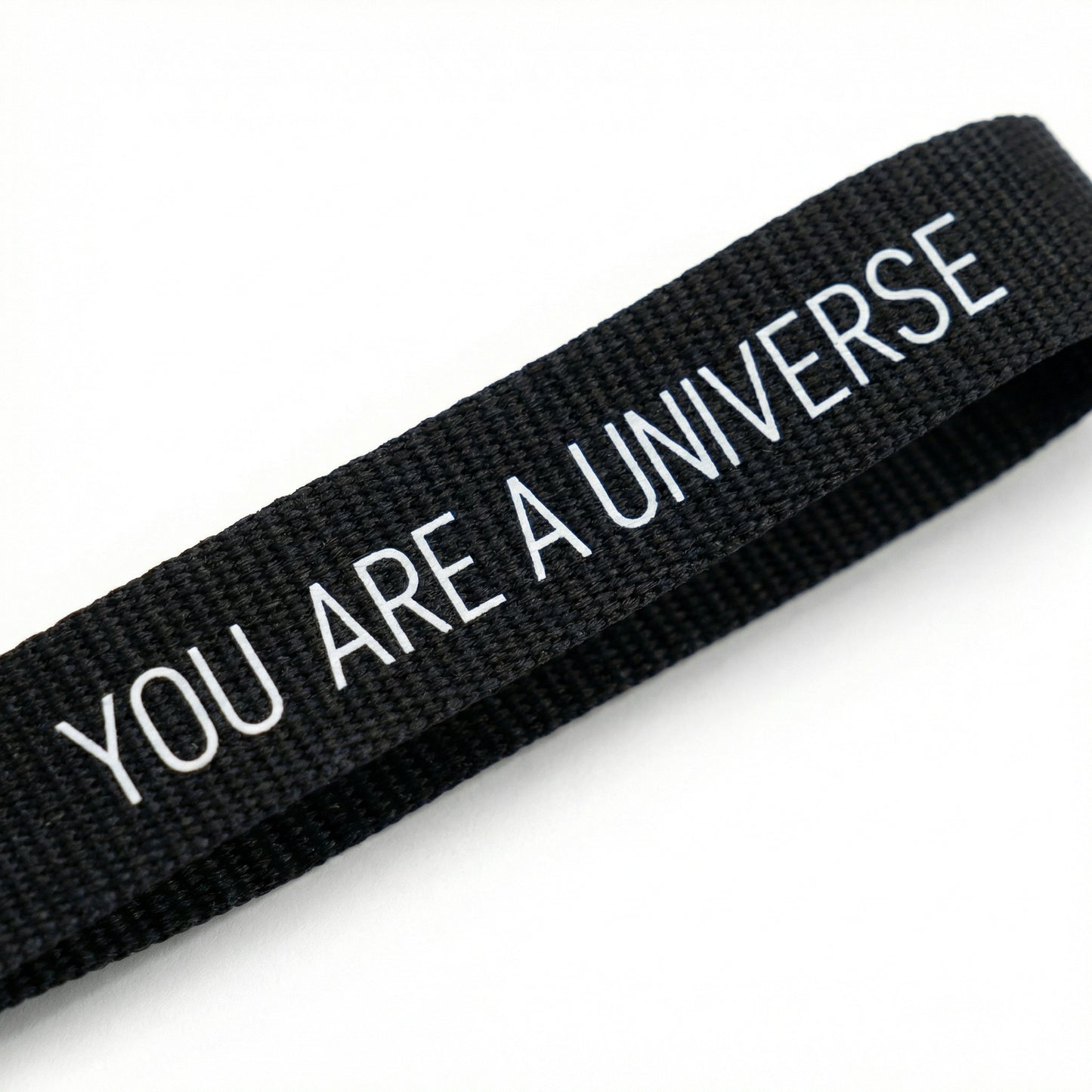 You Are A Universe strap detail - black bottle - studio macro