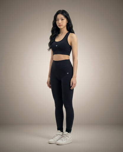 Myticos black sports bra and leggings three quarter view