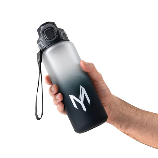 Hand holding Myticos water bottle with gradient gray and black color, featuring the “M” logo.
